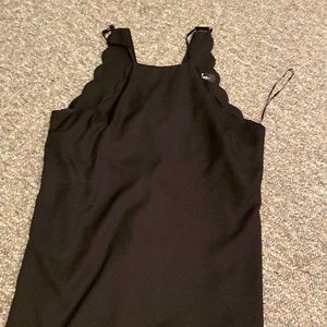 Black dress my favorite!! Wore for a Wedding , nothing wrong like new